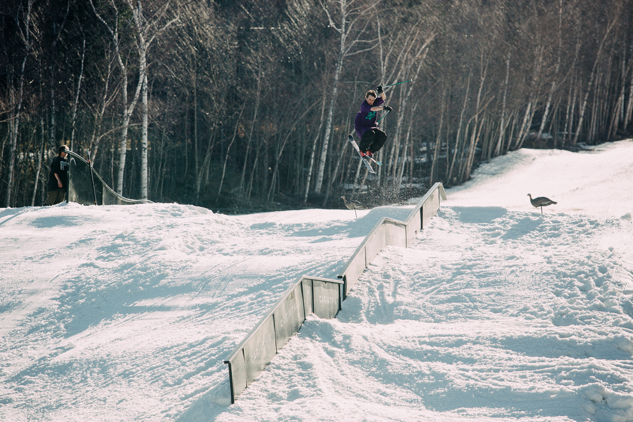 Vermont skier Tyler Duncan in the air over a rail at Mount Snow