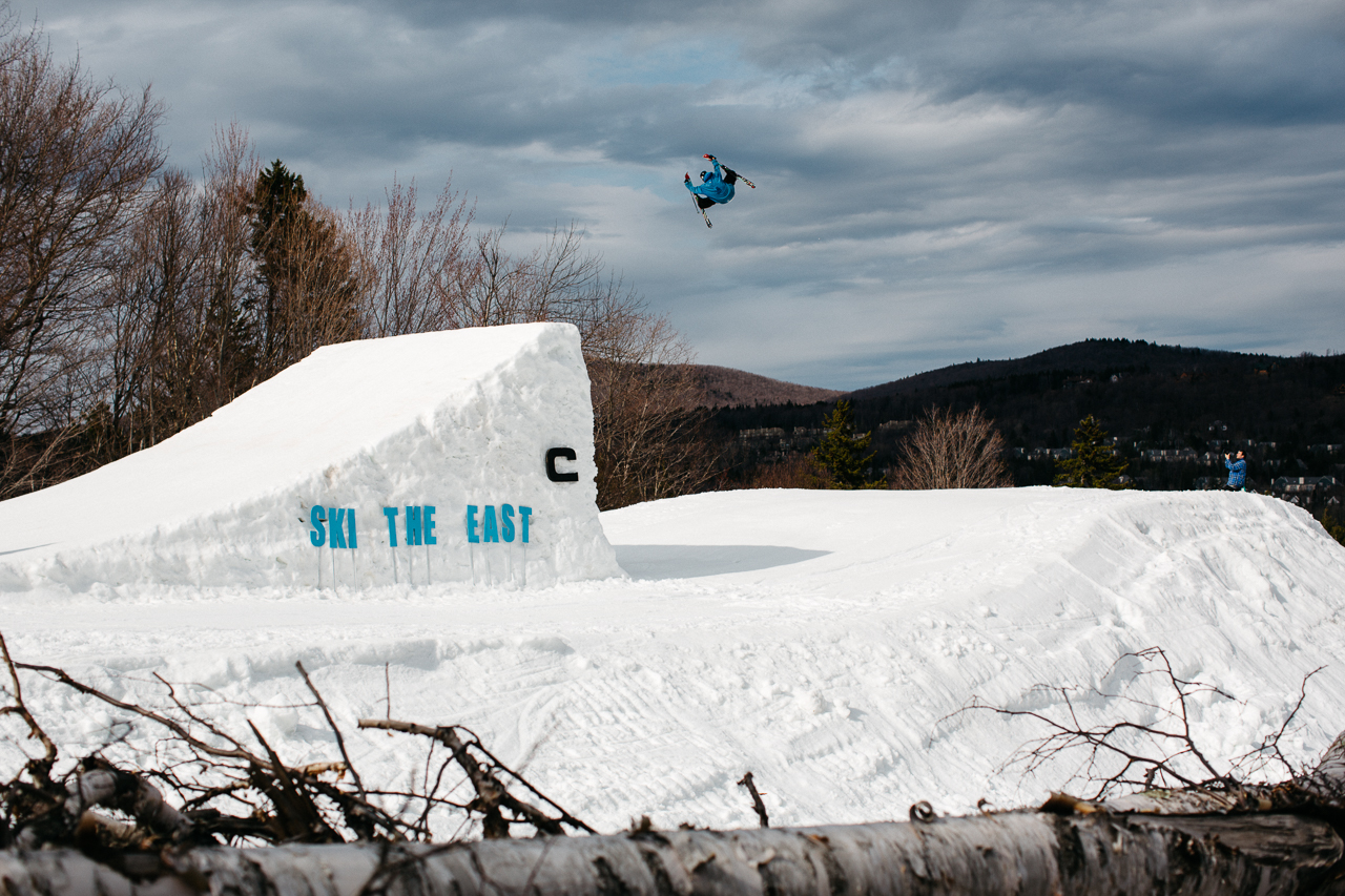 A skier, Tyler Mega, hits a jump at Mount Snow's Carinthia in Vermont