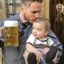Photographer Dan Brown with son Callan and large stein of beer in West Seattle